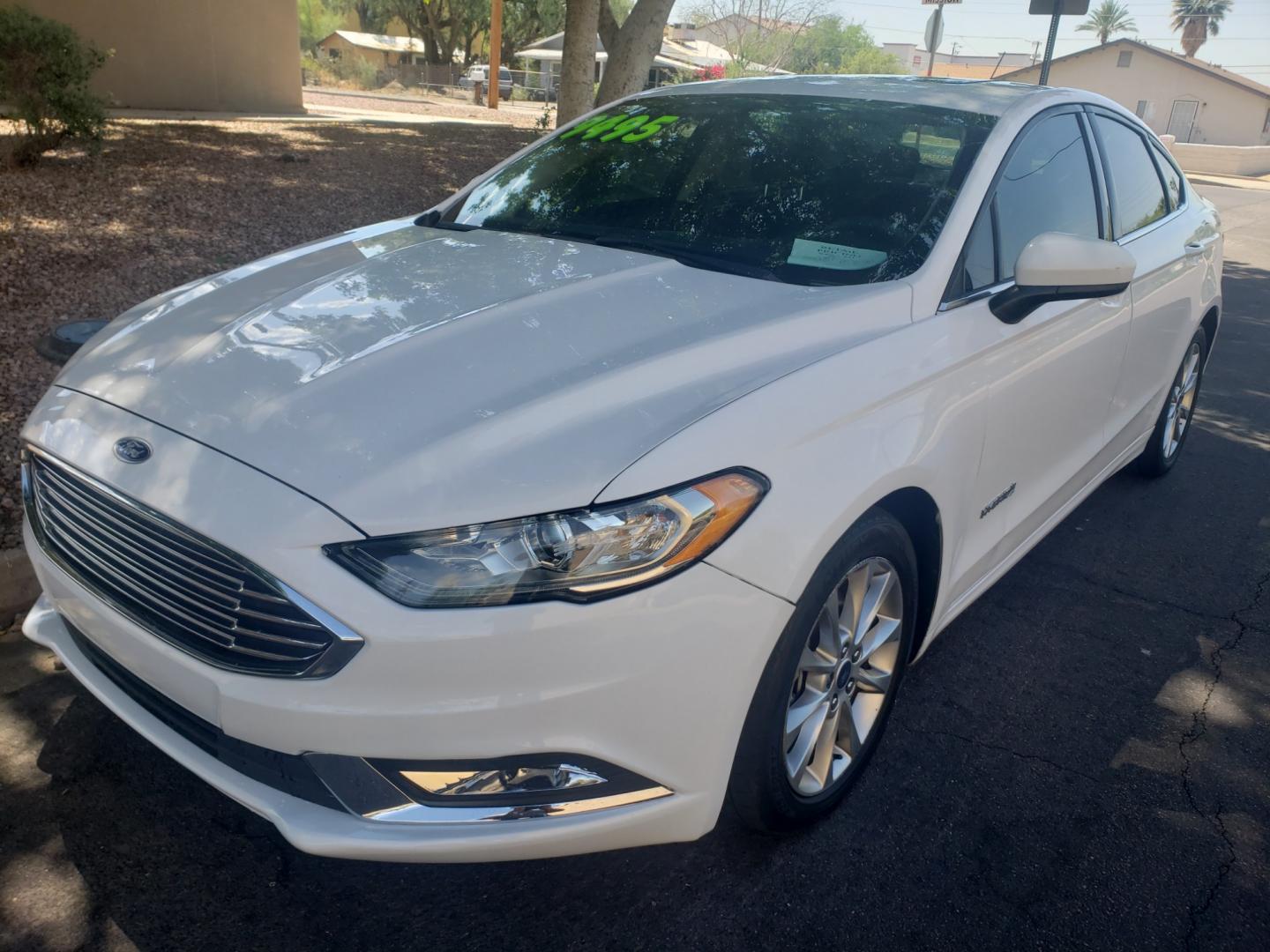 2017 WHITE /black Ford Fusion Hybrid SE hybrid (3FA6P0LUXHR) with an 2.4L L4 DOHC 16V engine, 6-Speed Automatic transmission, located at 323 E Dunlap Ave., Phoenix, AZ, 85020, (602) 331-9000, 33.567677, -112.069000 - 2017 Ford Fusion Hybrid SE,......EXCELLENT condition, A Real Must See!!.... No accidents, Power everything, Stereo/cd player, Phone sync, Bluetooth, Satellite compatible, Ice cold ac, Clean Black interior with Black cloth seats in near perfect condition, power windows, power door locks, Gorgeous tin - Photo#0